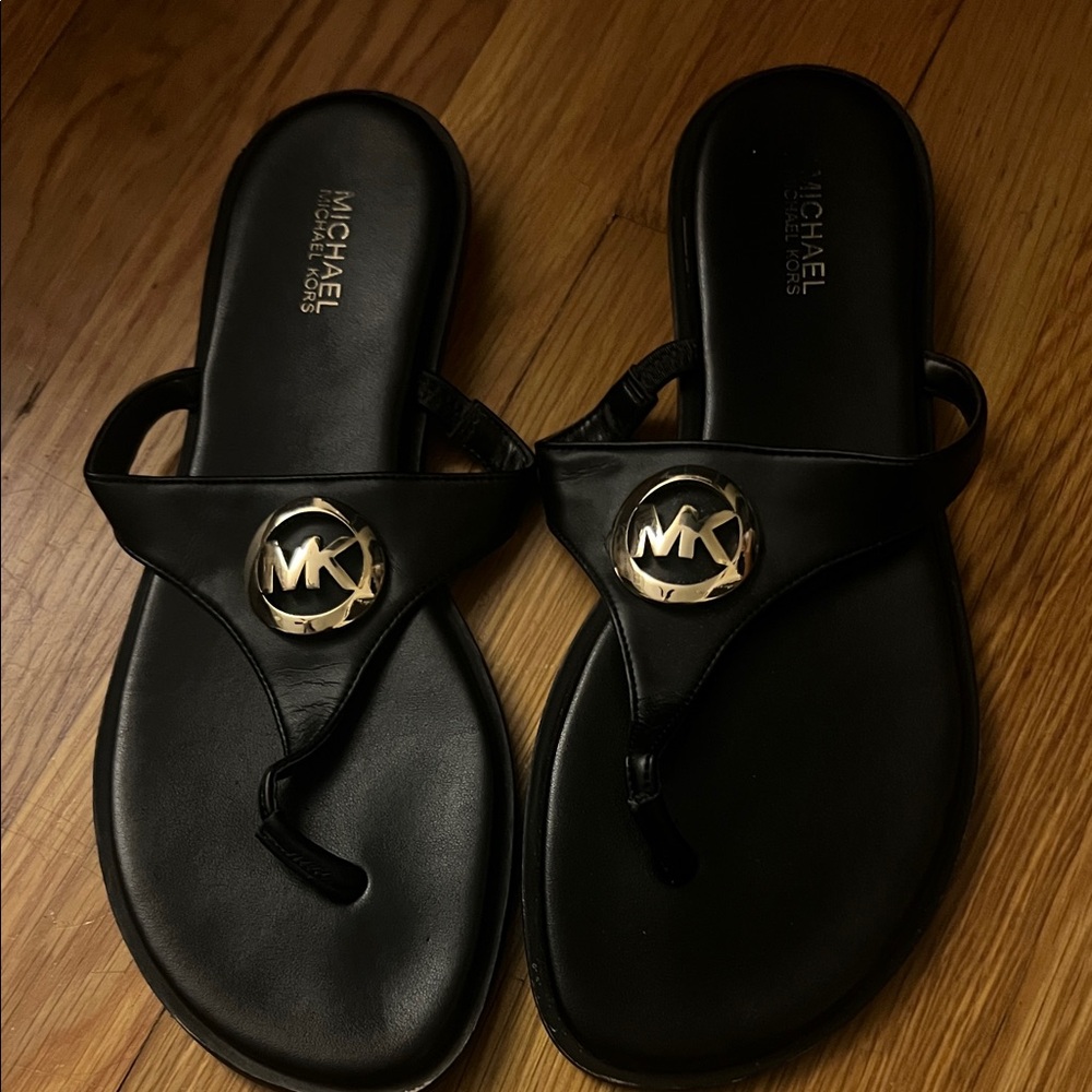 Michael Kors Black Thong Sandals with Gold Emblem